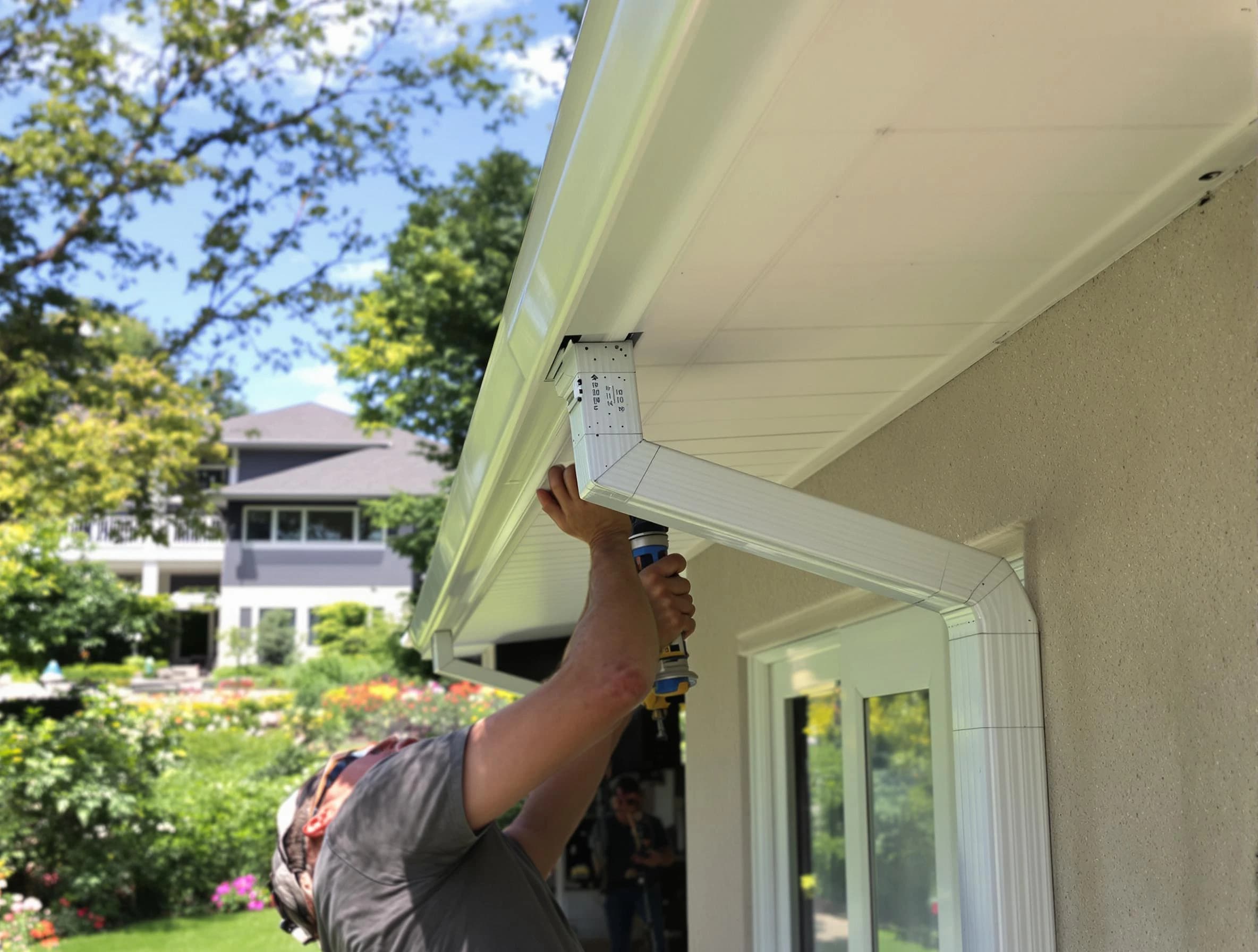 Berea Roofing Company technicians performing gutter installation in Berea, OH